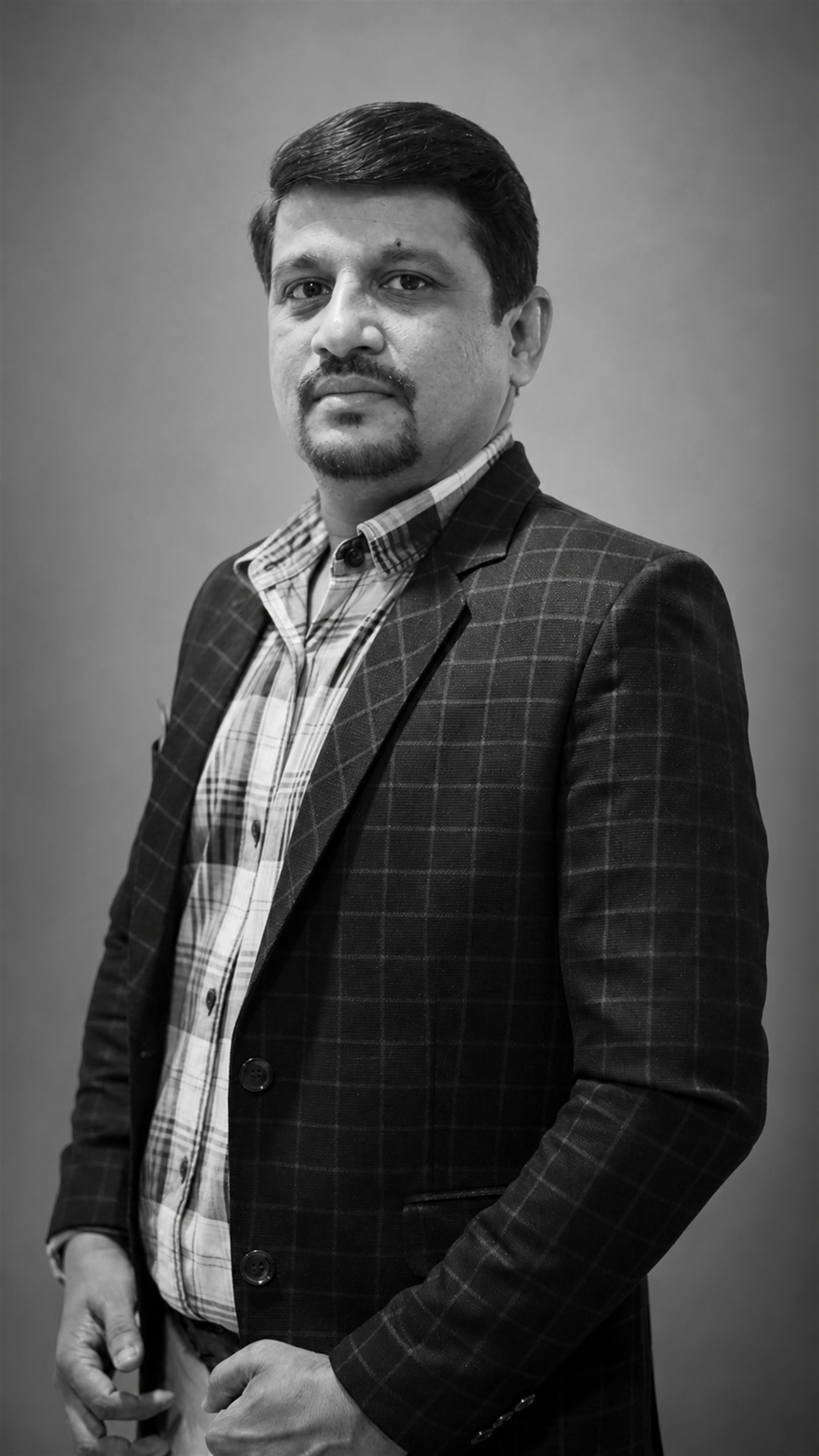 Mr. Kishor Sansare